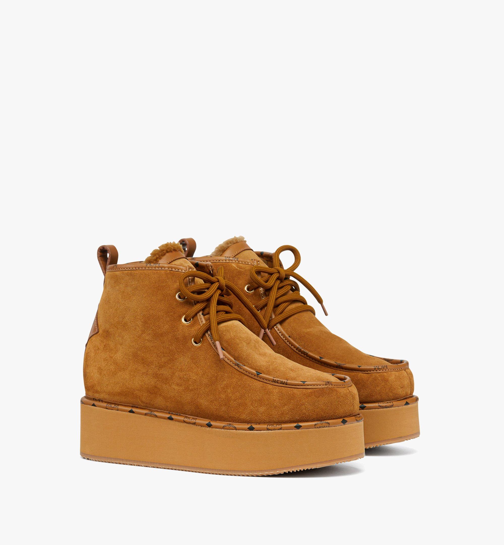 Bottes à plateforme en cuir de veau suédé 1